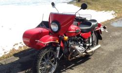 This 2013 Ural Tourist motorcycle with sidecar is practically new and in perfect condition! It has only 971 miles (the odometer shows the mileage in kilometers at 1619 kilometers). It has 2 years & 8 months, unlimited mileage, remaining on the