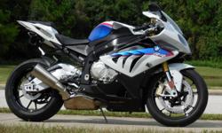 2014 BMW S1000RR HP4. The S1000RR has dominated the market since inception. BMW has tweaked the performance every year since&nbsp; the came out and the 14 has better handling and is 9lbs lighter and a upgraded suspension. This bike is the lightest