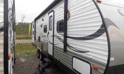 Last of the 2014's.Queen bedroom,entertainment system(DVD/Stereo),bunkhouse with 3 bunks and 2 fold out chairs,u-shape dinette folds down to make extra sleeping,jack knife sofa,bathroom with tub/shower and skylight,outside shower,earth tones,storage,power