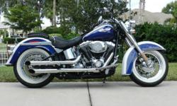 Low mileage - 5400
Pushrod V-twin
Two-tone white pearl/deep colbalt blue
Wide whitewall, a big retro-style tank mounted, and a 24.inch seat height make the Softtail Deluxe
the lowest riding bike of the Harley bunch
Text me : (281) 946-753zero or use my