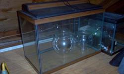 Traditional style aquarium ? holds 20 gallons and has a cover that is lighted. Extra equipment included. . Call Tom Taylor at 516 848 5179 or email me at Tom@mag4lists.com.