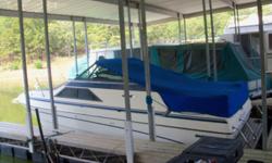 1980 blue and white 26' glastron cabin cruiser,ac heat,kit,bathroom section porta potty,nice, runs great,see too beleave, call jimmy at 405-863-2870 or 405-680-9383,it runs great