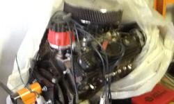 383 crate engine with carb and high output starter low miles tons of tourqe .