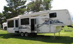 2006 Montana fifth wheel. 38 foot with four slides. good condition and roomy.