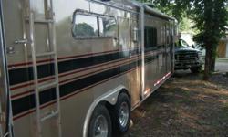 Lazy N 3 Horse Trailer 14 ft. living quarters full bath inside totally remodled Ref. Stove with hood 3 burner with oven, microwave Queen bed sofa/bed table/bed air cond. gas heat fully self contained nearly new tires with alum. wheels 14 ft awning new