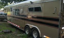 Lazy N 3 horse trailer with full 14 ft. living quarters, full bath. Remodled inside from floor to ceiling, 3 burner stove with oven, microwave. Air conditioning, gas heat . Referigator/freezer, 14 ft awning. Queen bed, sofa/bed, table/bed, horse part