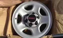 4 New GMC factory alloy rims, 16x7. 6 lug nuts with caps