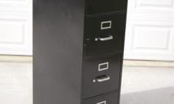 HON 310 Series, four-drawer, full suspension file, letter, lists @ $173. This great-condition file cabinet is yours for an investment of only $87.
No dents, everything glides smoothly. It is black, built of steel with 26 1/2" deep ball-bearing suspension