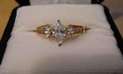 Certified Brilliant Cut Marquise Diamond by the International Gemmological Information 579 Fifth Avenue New York NY. Brilliant Cut makes it shine like the stars with SI clarity, certified colorless F, Ring 14K yellow gold with IMI number stamped inside,