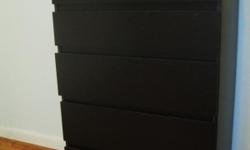 A five drawer Ikea dresser. Dresser is black in color and already assembled!!! Only problem is a scratch on the bottom front right corner. Will except offers. Email me if interested Grussian101@aol.com
