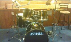 5 piece Tama drum set with cymbals, chimes, cowbell, double bass pedal, stands, and cases. In good shape used in church .cash only sale