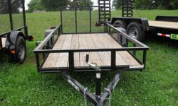 5' x 12' +1' Dovetail New Trailer with MSO
Frame - 3 x 2 Angle
Top Rail and Uprights - 2 x 2 Angle
Tongue - 3 x 2 Angle, A-Frame (3" Channel Wrapped Tongue on 14')
Standard Fender
Dexter 3500# EZ Lube Axle
New 175/80 13" Tires
Treated Pine Floor
Spare