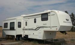 2000 King of the Road Royal Lite
36' all season artic package,3 slide outs,2 recliners,hide a bed couch,surround sound stereo,ceilings fan,AC, heat, large 2 door refrigerator/freezer, large closets with lots of drawers, very "roomy" , nice outfit, can be