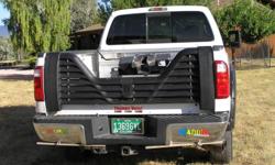Stromberg Carlson 4000 series 5th wheel louvered tailgate.&nbsp; Locking tailgate that mounts securely with rotary latches and coated cables.&nbsp; Fits Ford trucks - 63 inches wide.&nbsp; Excellant condition