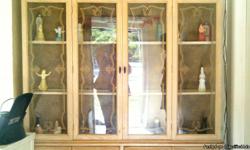 China Cabinet. Beige with speckles. Glass doors. Shelving and storage units below.4 doors and in good condition. Dimensions are as follows: 6 foot 8 inches high x 5 foot across x 13 inches in length. Asking $ 500.00 OBO, Buyer must transport! Comes in two
