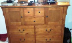 Ashley Furniture 6 Piece Maple Bedroom Suite includes: Headboard, Footboard w/rails, Chest of Drawers (5), Dresser (9 Compartment), Mirror, Nightstand. $600.00 Firm...MUST SELL! MOVING OUT OF STATE....needs to go this weekend as we are leaving on Friday!