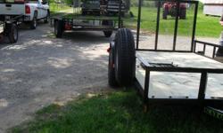 Utility Trailer:?6'4" x 12' Gator Trailer
Most of our standard utility trailers have power ramp assist and jack foot is included. It is so easy and convenient to work with. This kind of trailer are commonly used for lawn mowers, zero turn mowers, ATV?s,
