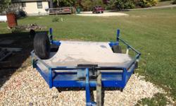 Trailer sits low and is great for hauling awn mowers, motorcycles or ATV'S, etc...
Has a Diamond plat&nbsp;deck and all new tires and spare tire. Hitch and safety chaims are new also.
&nbsp;