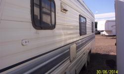 94 Dutchman 30' travel trailer, self contained, new ref, furnace fan motor, good ac, needs work. Sale is as is.&nbsp;