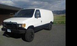 94 Ford E350 4x4 Van. 300 F.I. 6cyl with C6 Auto tranny. Good gas mileage, good torque. High miles but I truly believe the motor has been replaced (can't prove it)... because it runs extremely smooth with no knocks, no leaks, etc. Extremely well designed