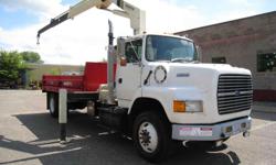1994 Ford L9000 with articulating crane and contractor dump body. 599,000 miles, manual transmission, 260 hp L10 Cummins engine.
J-Craft dump body measures 16' long with 12 ton hoist.
National N-80 articulating crane with a max capacity of 14,400 lbs. The