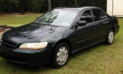 4 cyl., auto. trans., cold a/c, good tires, power windows/locks, cruise control, am/fm radio, new window tint, good condition, 1 owner, Dark green ext., beige cloth int., 275,000 miles