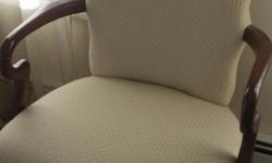mahogony arms and legs natual fabric seat and back paid $350 used almost never. Great for living room or bedroom