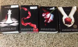 All 4 twilight books, the first 2 are paper back but the last 2 are hard backs, perfect condition