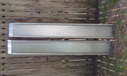 Pair of 8' expandable aluminum ramps. Great for wheel chairs, lawn mowers, 4wheelers, etc. 500# limit