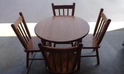 Amish made children's table and chairs.&nbsp; Medium oak - good condition.&nbsp; $100 OBO