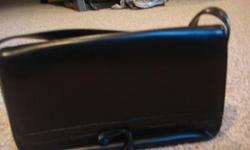 Ann Taylor black leather hand bag with bow and open stiching along border.
Good condition. Thanks