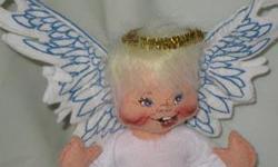 Annalee Angel with Blue on Wings
approximately 7" tall
1993
#7108, comes with hang tag
there is no Annalee box or bag
the wings have come unattached and are just resting on the back in the picture, they can be glued back
pre-owned in great condition from