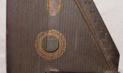 Antique auto harp, been in the family for a hundred + years.
Make a serious offer and you may&nbsp;own it.