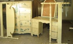 antique solid mahogney bedroom set.Cedarrobe dresser W/mirrow,head and foot board.contact pat 985 807-3054.