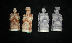 Complete chess set hand made of ivory. 1920's era . One side tinted blue and the other reddish. All pieces accounted for. In original wooden box.