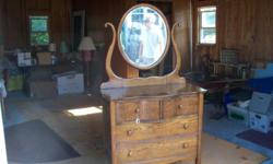 If you're looking for a nice piece of furniture to finish off a room in your victorian home---check this out.
An excellent condition antique dresser WITH attached mirror. Call after 7pm to set up an appointment to see this fine piece of furniture.