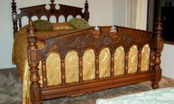 DON'T MISS THIS ONE!!&nbsp; Antique oak full size double bed from the early 1900's.&nbsp; The head and foot board have carved rosettes.&nbsp; Also, a like new mattress, all in excellent condition.&nbsp; BEAUTIFUL!!