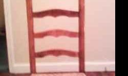 1 antique high back chair totally restored. It has been sanded and re-varnished & it has a new wicker bottom. Asking $30.00 contact # 864-784-2597. Serious inquires only. NO SPAMMERS!