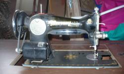 Sewing machine is in good condition, great for a collector or even to use to sew, yes it works!