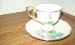 BEAUTIFULLY GLAZED CERAMIC WATER LILY DESIGN TEA CUP AND SAUCER.50 YRS. OLD - IN PERFECT CONDITION WITH NO CHIPS. GOLD TRIMMED HANDLE AND RIMS.-$15.
CONSIDERED AN ANTIQUE - MAKES AN EXCELLENT GIFT.
*VINTAGE(40+YRS OLD)2 PC. PITCHER &BOWL SET -$30
STAMPED