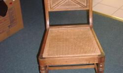 Very nice vintage side chair with caning on seat and part of back. Nice design on top rail on seat back. This is in fantastic condition and has nice detail on seat back and legs. Made of hardwood, not sure what type but looks like it might be maple or