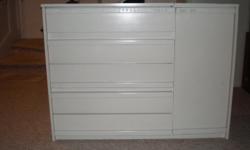White dresser / change table. Has drawers and shelves for storage.
49 3/4 inches wide. 18 1/2 inches deep. 37 inches high