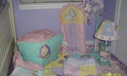 Excellent Deal! Paid over $300 for the whole set. Sophisticated baby girl bedding set, its comes with 2 sheet sets, comforter, crib skirt, crib dumper pad, 2 window valence, lamp, mobile that make music and diaper holder. If interesting call and leave a