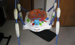Fisher Price Deluxe Jumper, has lights, music and hand toys connected. Immaculate and a great place for little ones who can't walk and adjusts in height to four higher positions to use after their legs grow longer. It is 39" high and 28 inches wide.