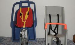 Two baby bike seats in good condition and have all safety harnesses.