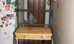 Bakers Rack is green metal and wood. Good condition, barely used. Has two drawers. Breakfast bar also green and wood. Has two stools.