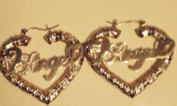 "Bamboo Heart design" &nbsp; &nbsp; Name "ANGEL" &nbsp; &nbsp; &nbsp;These&nbsp;Statement Earrings are &nbsp; MUY BONITA !!!!! &nbsp;Staring Cost for &nbsp;$47.50 OR&nbsp;BEST OFFER
&nbsp;
Real Siver,Gold plated,Hghly intricate Design,with Cross