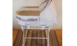 Baby Bassinet, excellent condition...It can also be used as rocking bassinet...it has wheels with lock to move around....All clothings can be removed easily and are machine washable....reason for selling not being used much and taking up room. Come from
