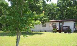 a beautiful must see!! 2 br 1 bath mobile home with shingle roof!! beautiful landscaped front and back yard... sits on close to 1.5 acres on the very end of a dead end street!! lots of privacy! has good size storage shed which has a concrete floor!! very