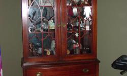 Absolutely gorgeous armoire/buffet in fantastic condition. This is a beautiful piece and would look great in your home. The finish is in fantastic shape.